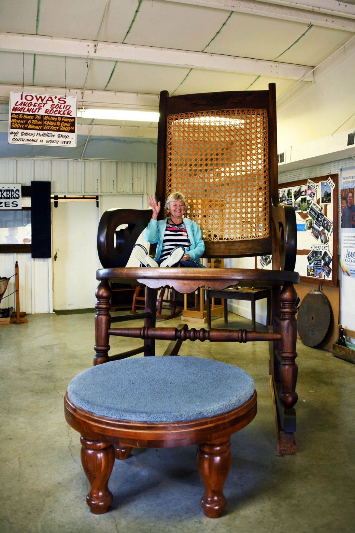 009 Sylvia Epp on Iowa's largest solid walnut rocker.JPG